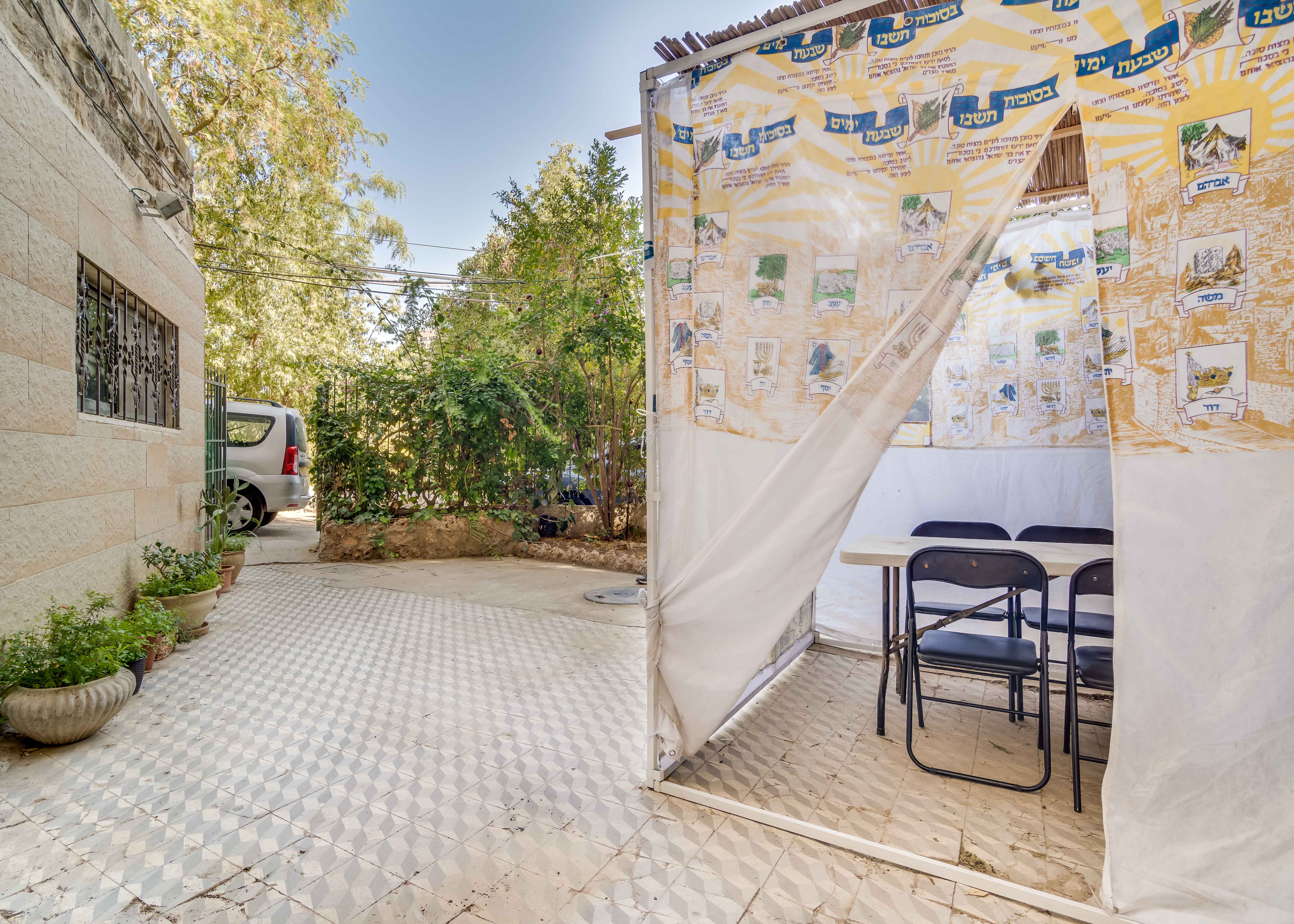 Sukkah in Courtyard of Building